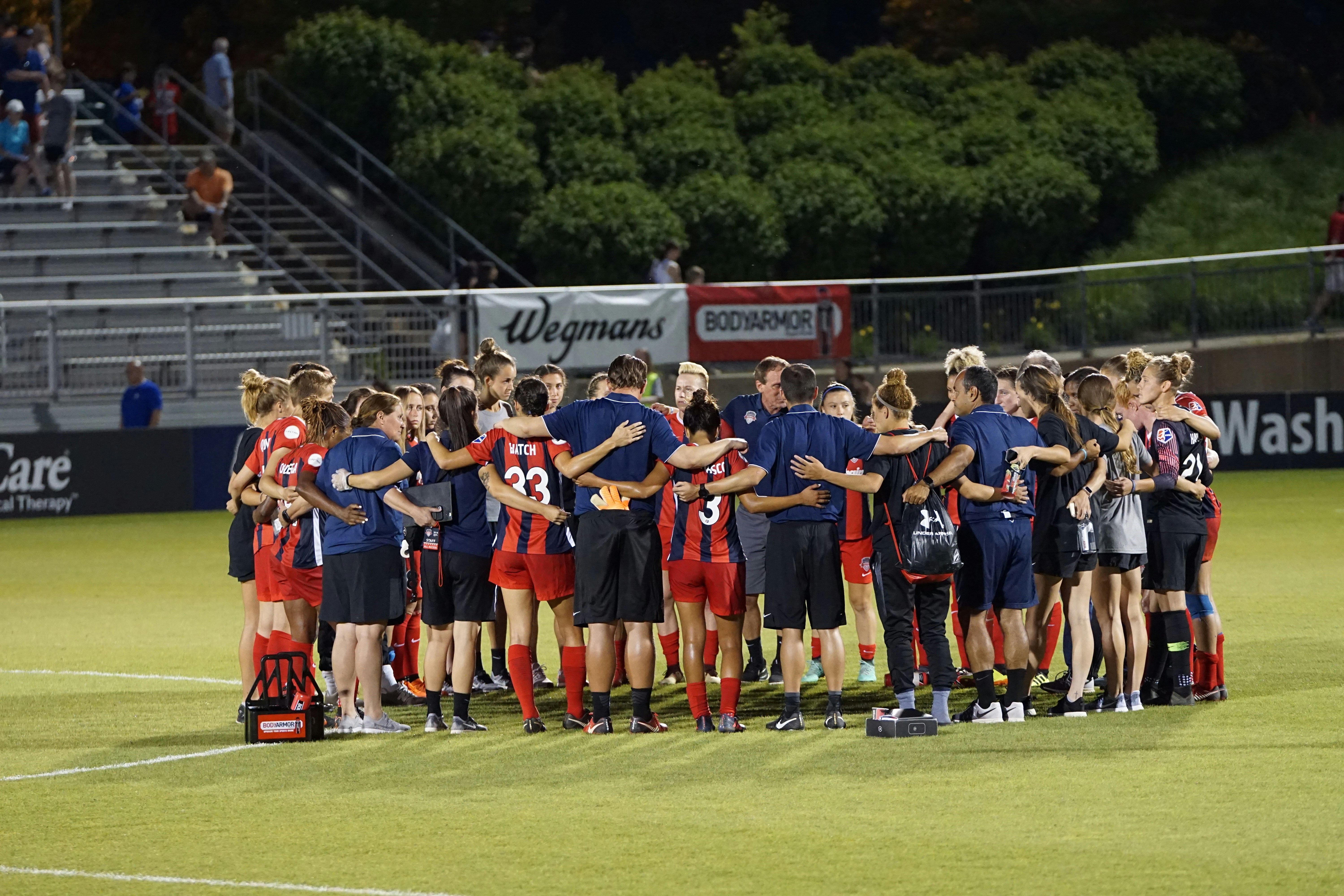 Soccer team huddle